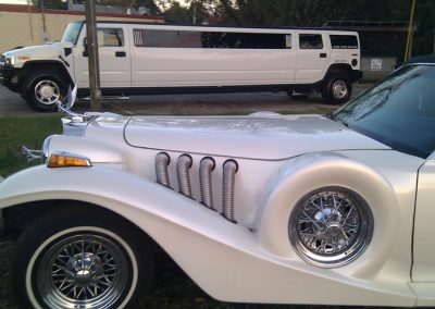 Stretch SUV Limo with vintage car